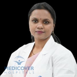 Dr Srujana S