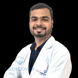 Dr Tushar Vijay More