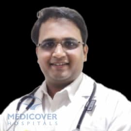 Dr Kapil Pore
