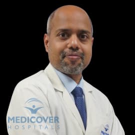 Dr Arvind J Vatkar